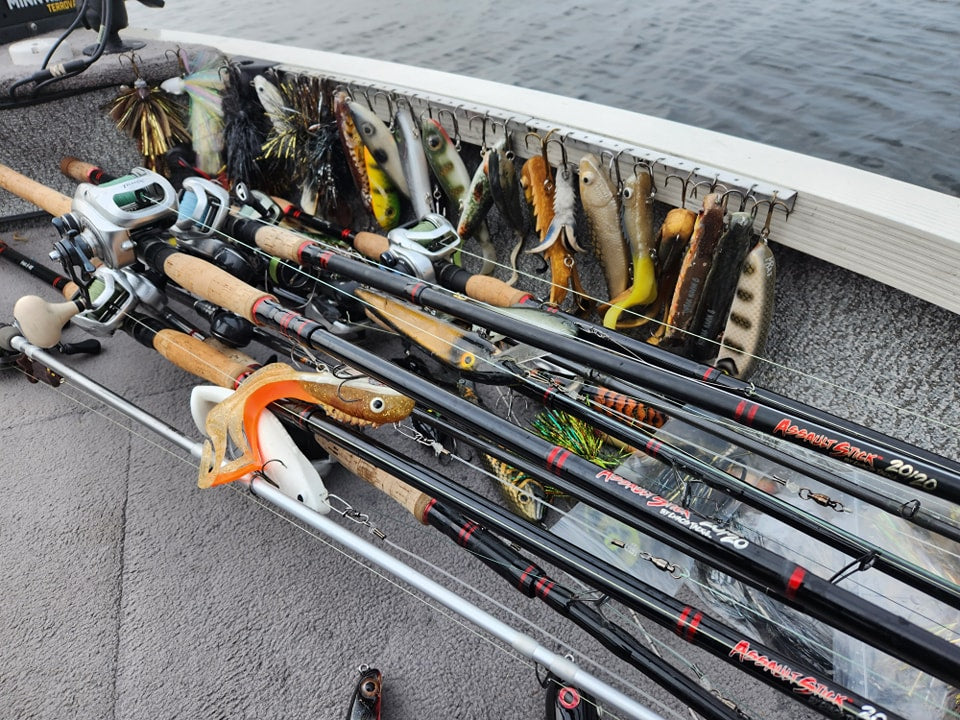 Baits and Lures and fishing Rods on a boat